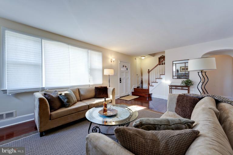 713 Charing Cross Road Baltimore, MD 21229 - Photo 24 of 29 a living room with furniture and a large window