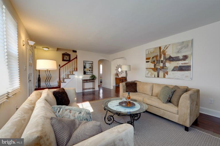 713 Charing Cross Road Baltimore, MD 21229 - Photo 25 of 29 a living room with furniture and wooden floor