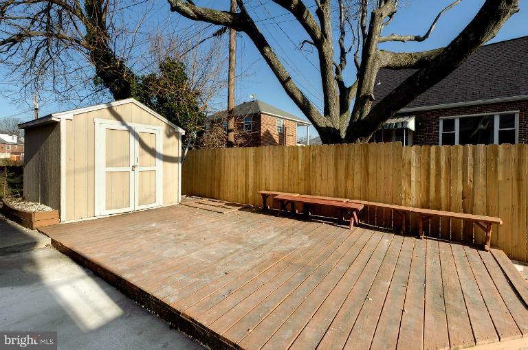 713 Charing Cross Road Baltimore, MD 21229 - Photo 5 of 29 a view of backyard with a deck