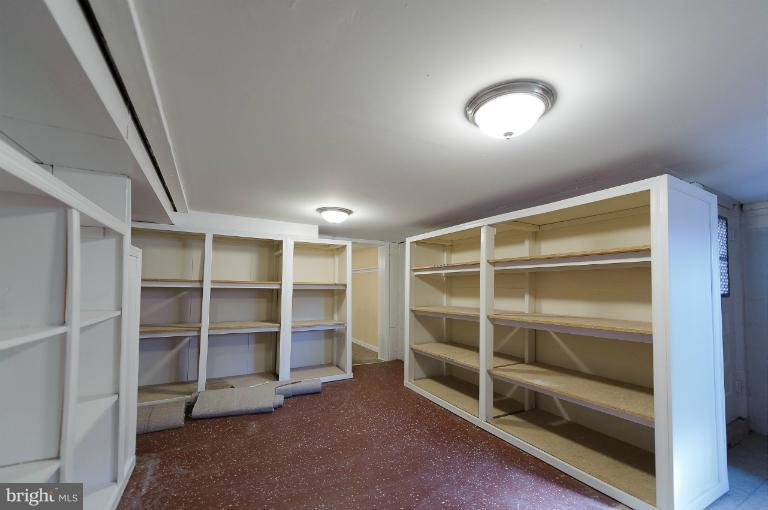 713 Charing Cross Road Baltimore, MD 21229 - Photo 7 of 29 a view of an empty room with a staircase