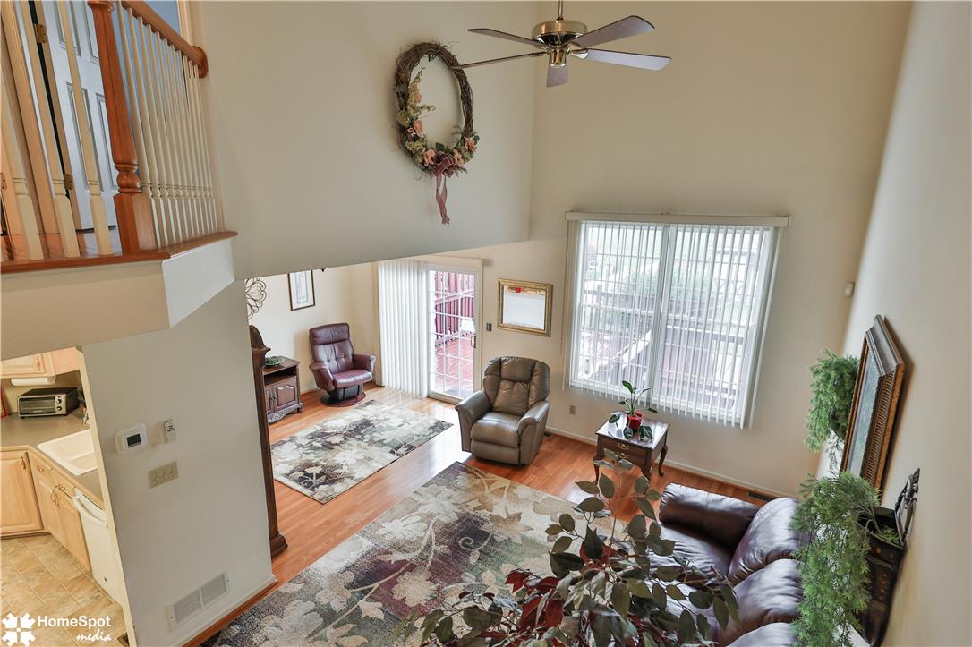 507 Howertown Road Northampton, PA 18067 - Photo 18 of 46 A well-lit living area features high ceilings and polished hardwood flooring throughout.