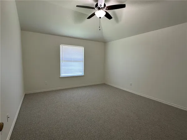a bathroom with a double vanity sink mirror and toilet