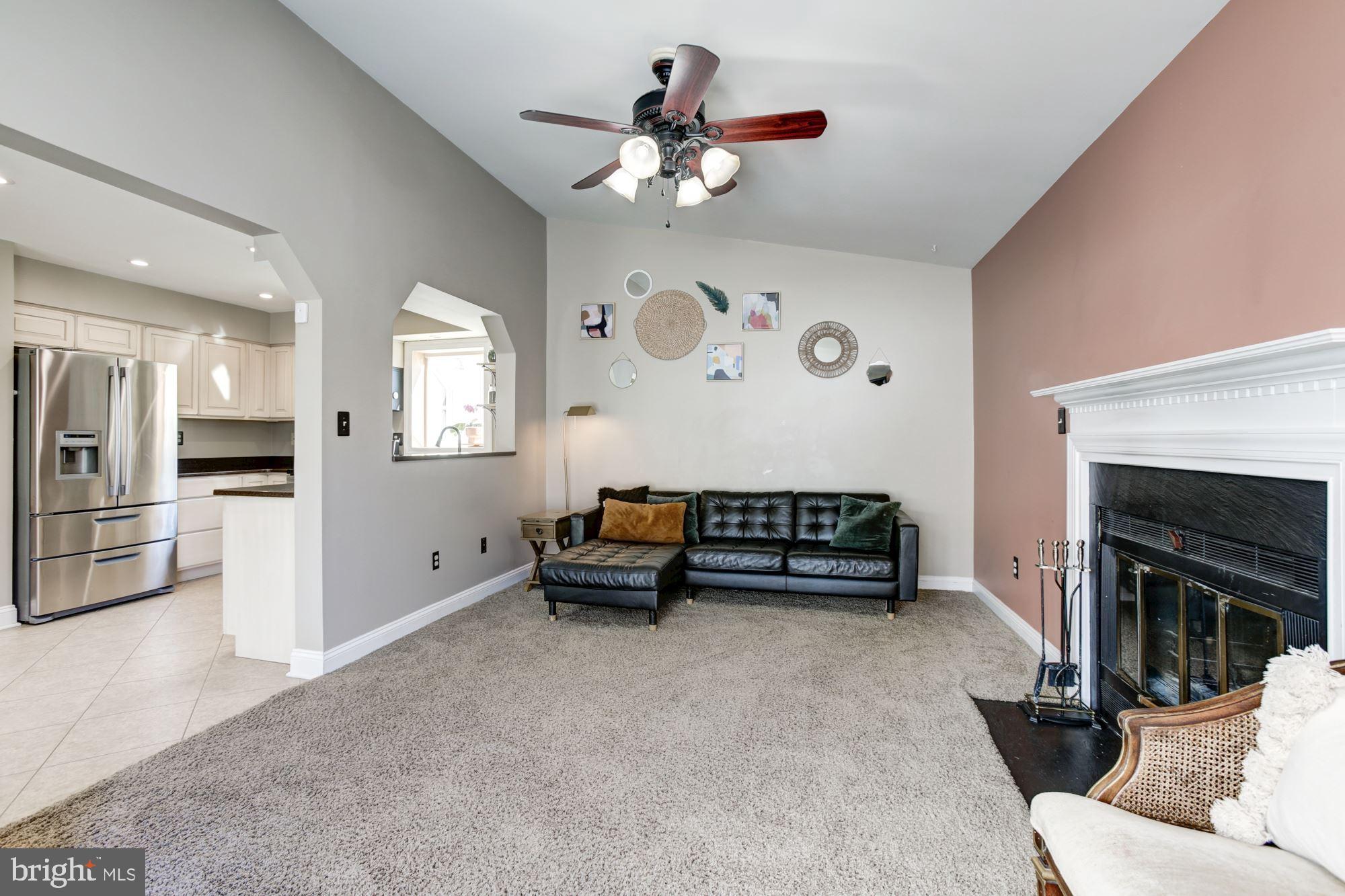 6721 Summer Rambo Court Columbia, MD 21045 - Photo 15 of 48 Family Room | Fireplace | Vaulted Ceilings