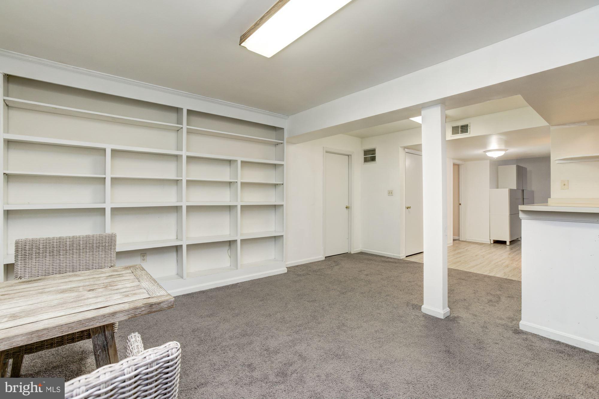 6721 Summer Rambo Court Columbia, MD 21045 - Photo 32 of 48 Recreation Room | Wet Bar | Built In Shelving