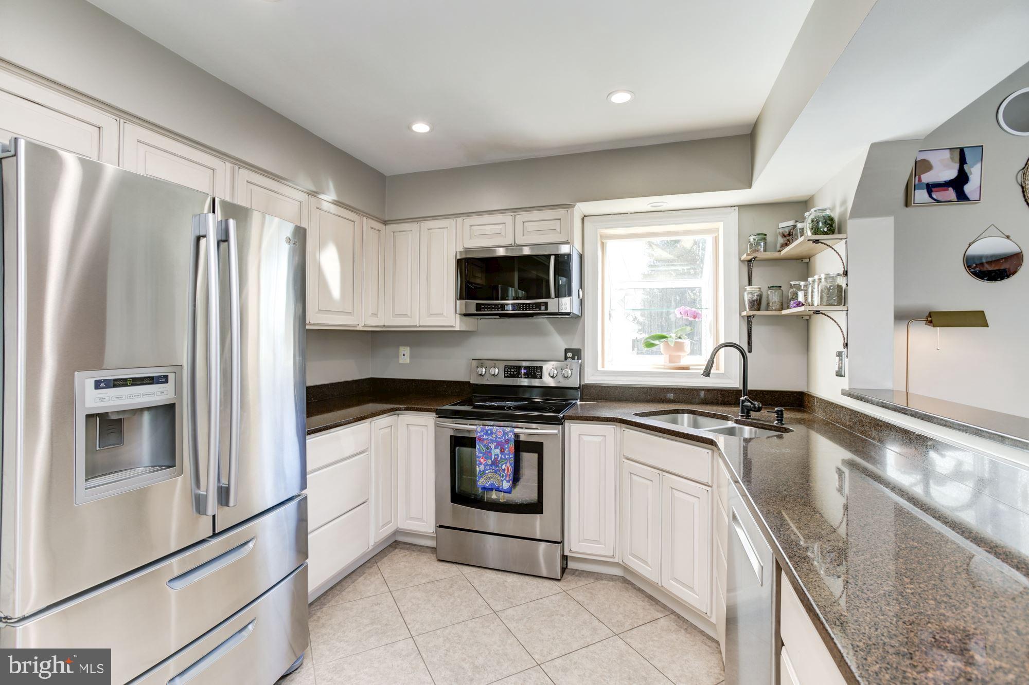 6721 Summer Rambo Court Columbia, MD 21045 - Photo 10 of 48 Sleek Stainless Steel Appliances