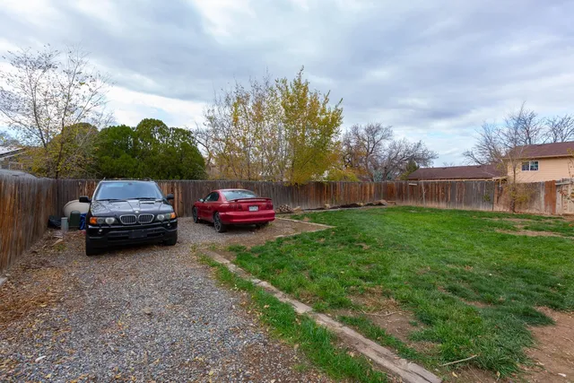 a house view with a garden space