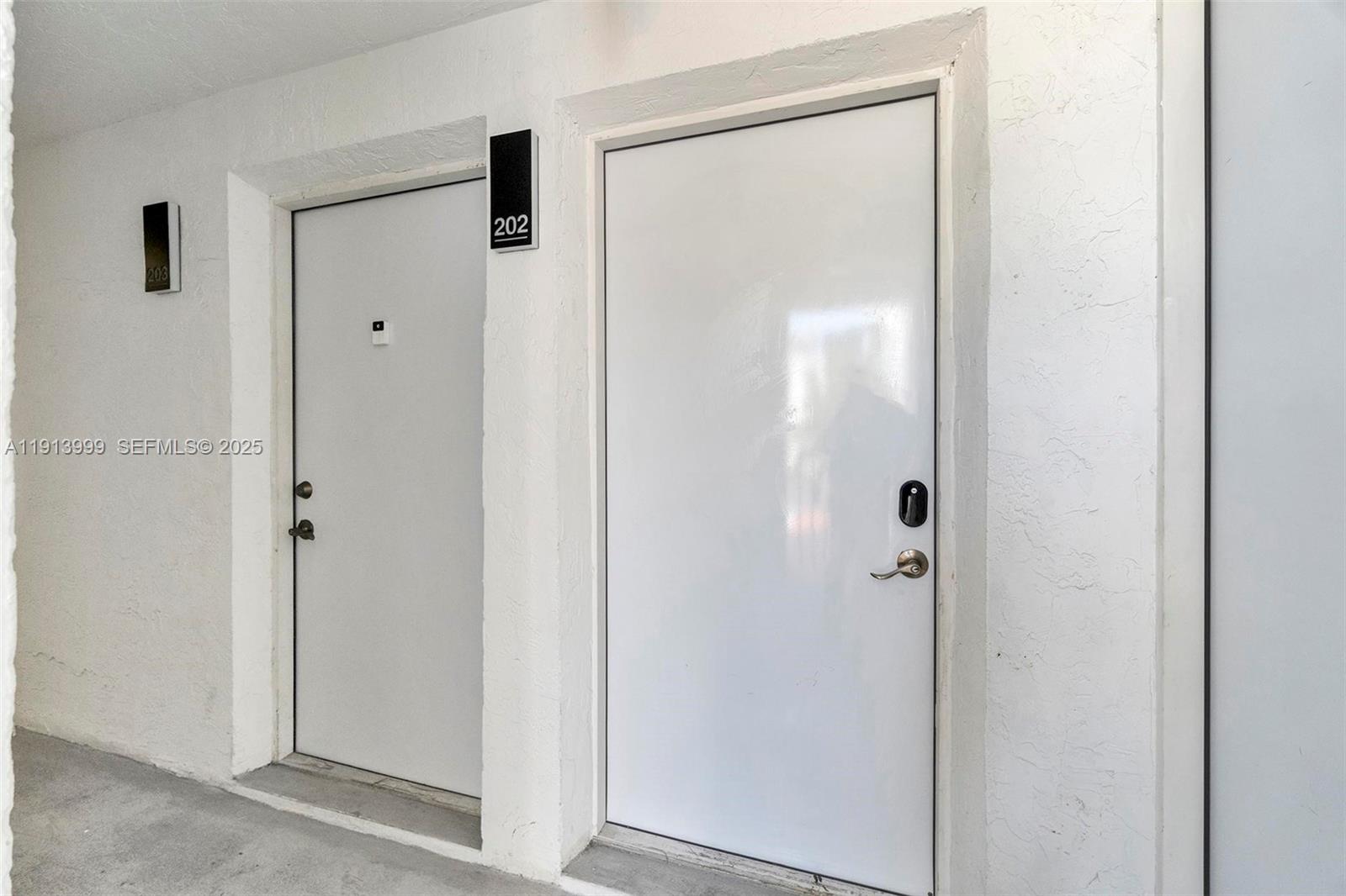 620 Southwest 10th Street, Unit 202 Miami, FL 33130 - Photo 11 of 20 a bathroom with a glass shower door