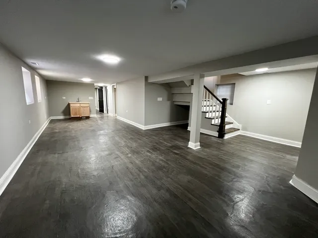 a view of entryway with wooden floor