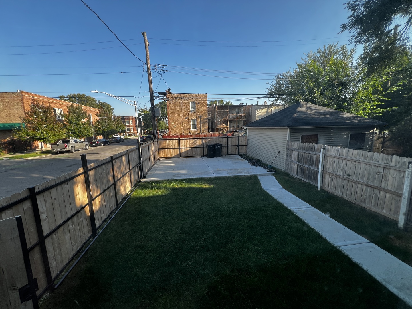 4956 West Erie Street, Unit 1 Chicago, IL 60644 - Photo 20 of 25 a view of a house with a yard