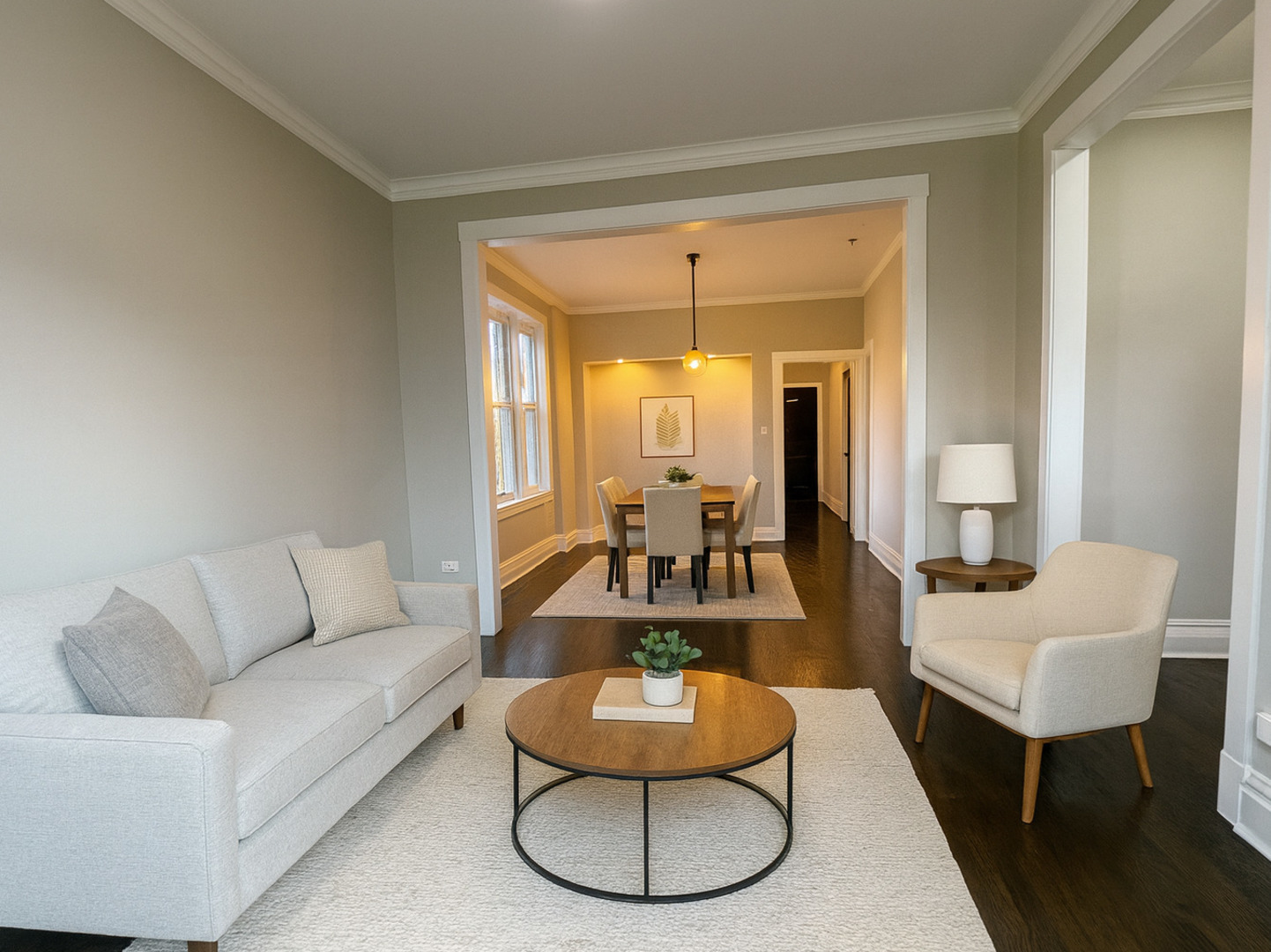 4956 West Erie Street, Unit 1 Chicago, IL 60644 - Photo 2 of 25 a living room with furniture and a large window
