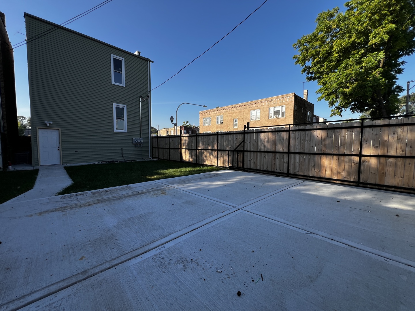 4956 West Erie Street, Unit 1 Chicago, IL 60644 - Photo 23 of 25 a view of a backyard