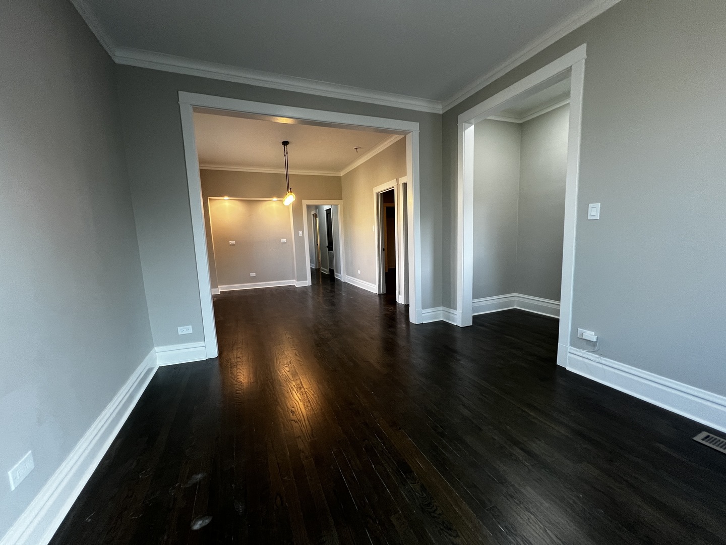 4956 West Erie Street, Unit 1 Chicago, IL 60644 - Photo 10 of 25 a view of a hallway with wooden floor