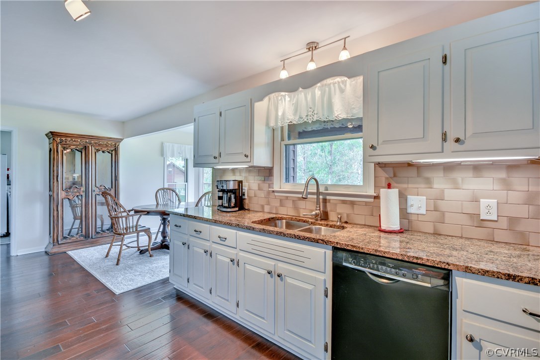 2661 Bibb Store Road Louisa, VA 23093 - Photo 12 of 35 a kitchen with granite countertop white cabinets and white appliances