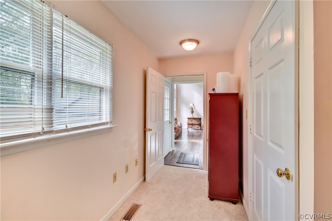 2661 Bibb Store Road Louisa, VA 23093 - Photo 16 of 35 a view of a bathroom with a walk in closet and bedroom
