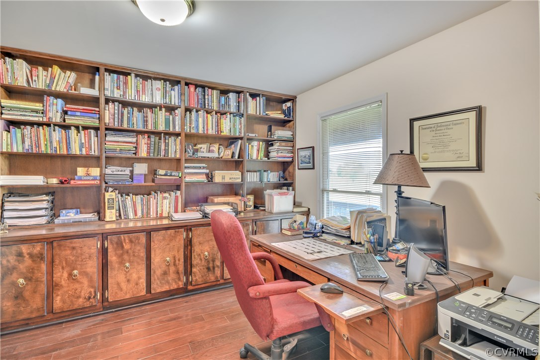 2661 Bibb Store Road Louisa, VA 23093 - Photo 19 of 35 a work room with furniture a bookshelf and a window