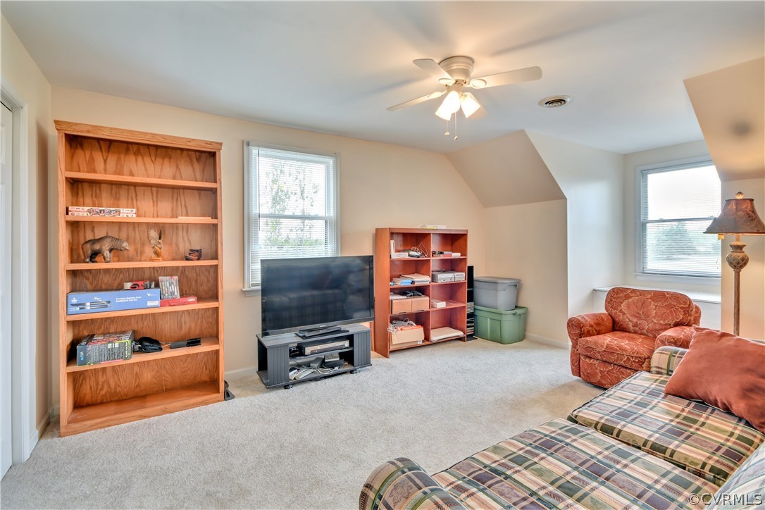 2661 Bibb Store Road Louisa, VA 23093 - Photo 27 of 35 a living room with furniture and a flat screen tv