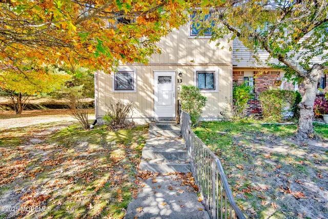 a view of a yard in front of a house