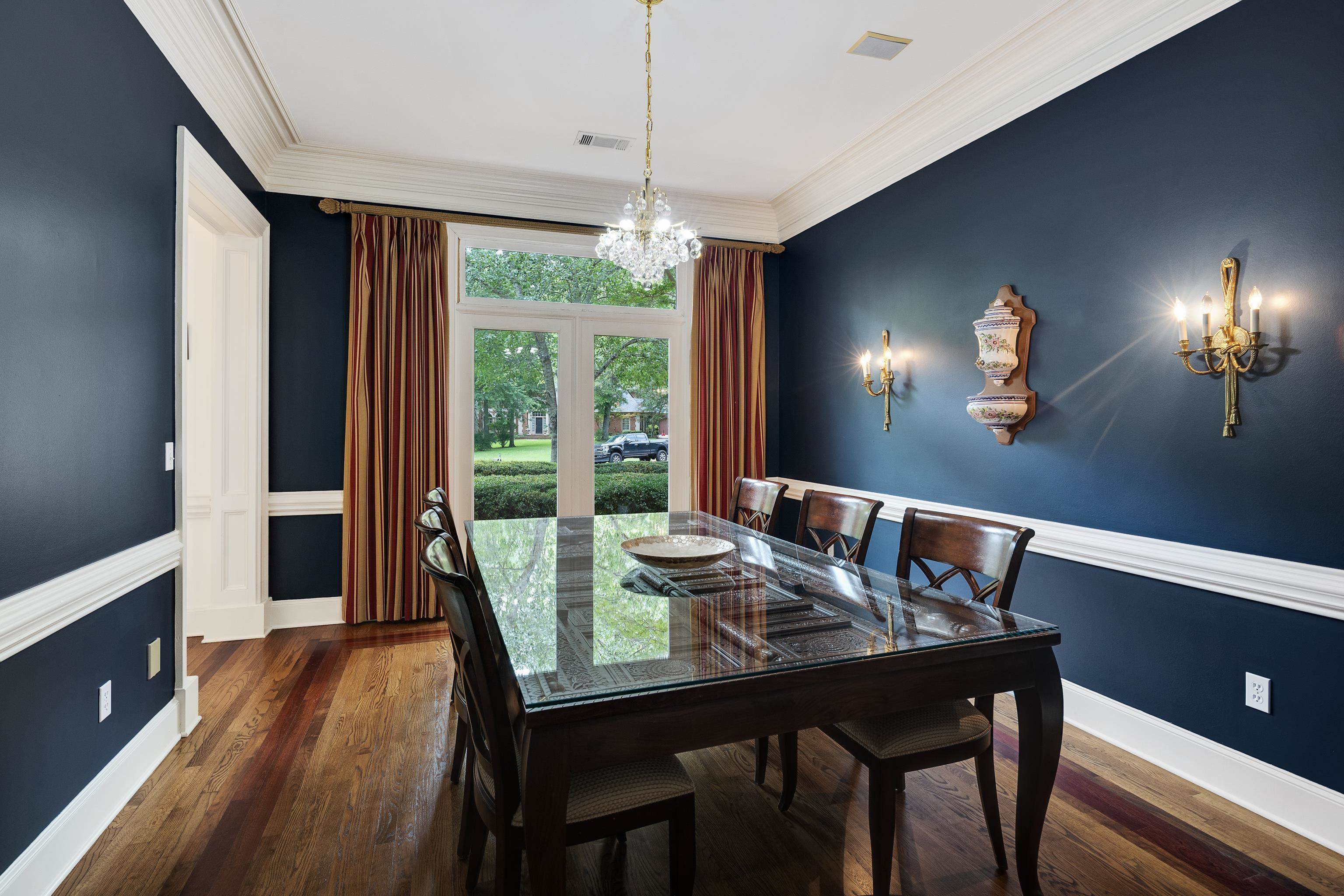 350 Bluff Ridge Cove Memphis, TN 38018 - Photo 19 of 37 Formal room featuring deep blue walls and wood-finish flooring