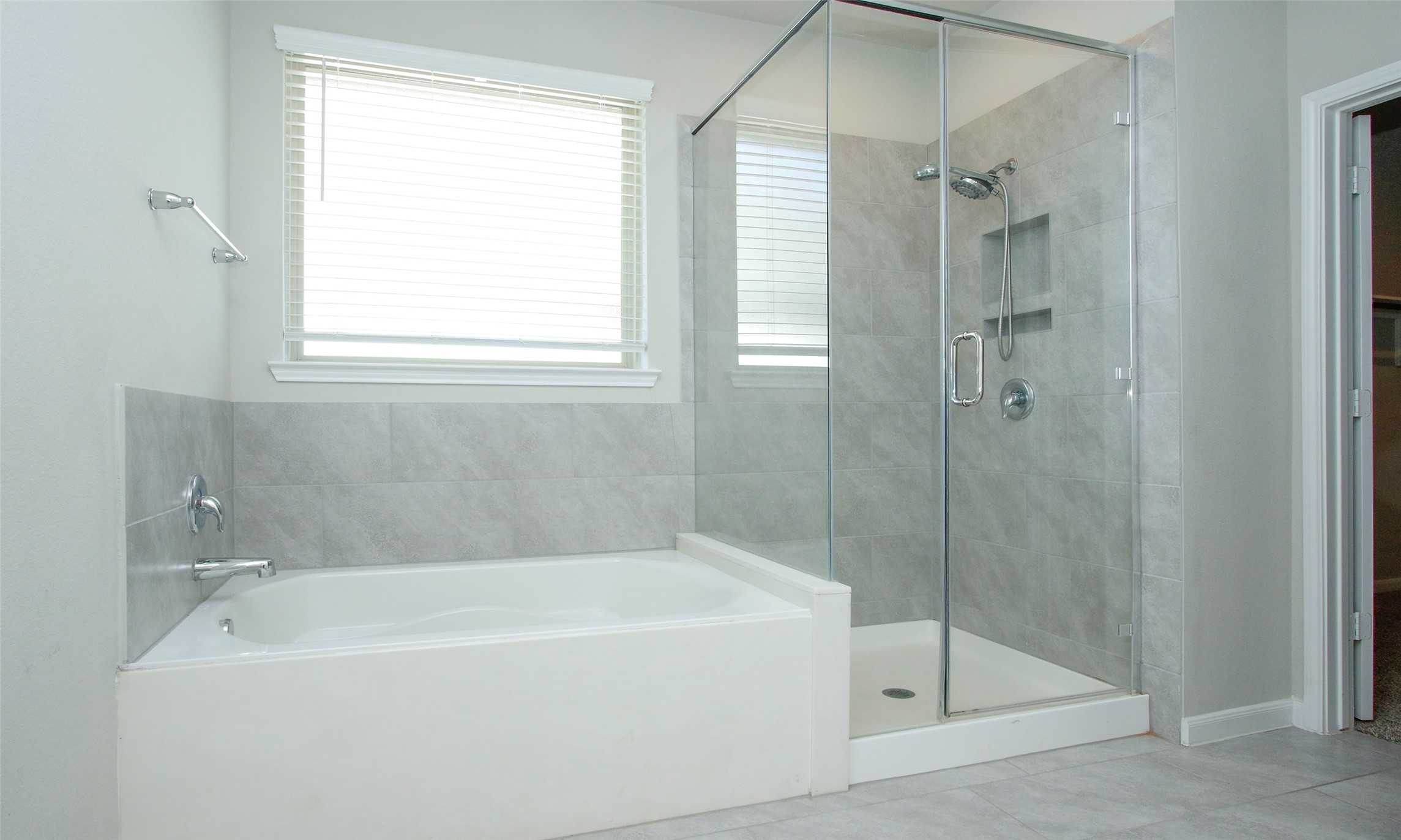 14120 Sand Ridge Court Conroe, TX 77384 - Photo 23 of 43 a white bath tub sitting next to a shower
