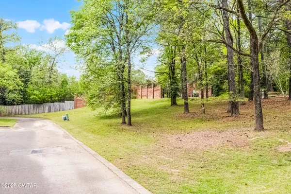a view of a park with swings
