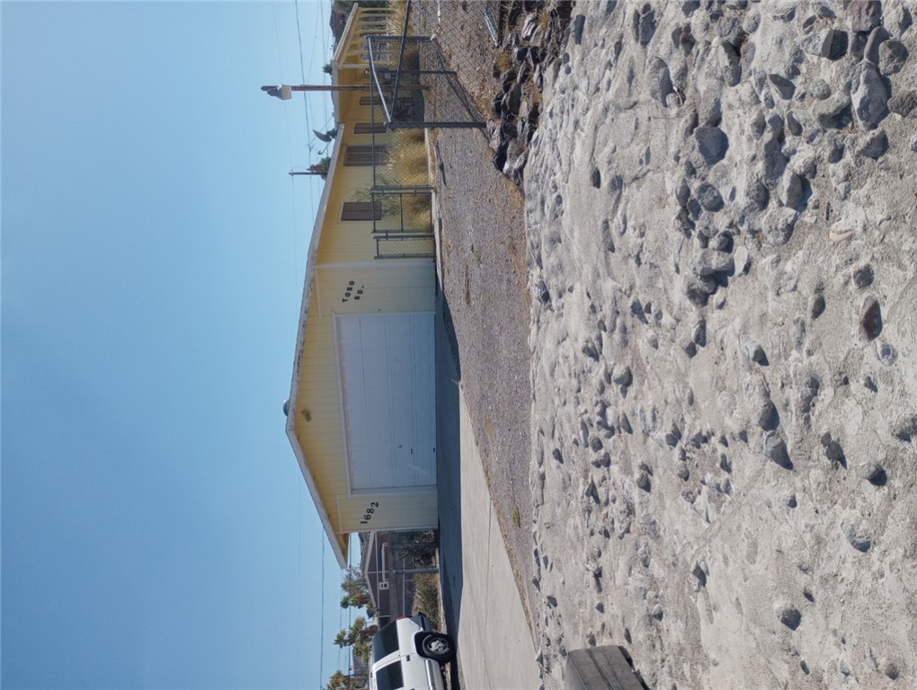 1682 Toro Road Bullhead City, AZ 86442 - Photo 1 of 30 View of front of property with a garage