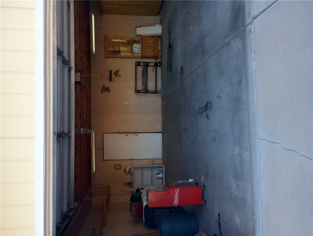 1682 Toro Road Bullhead City, AZ 86442 - Photo 23 of 30 Garage featuring a garage door opener