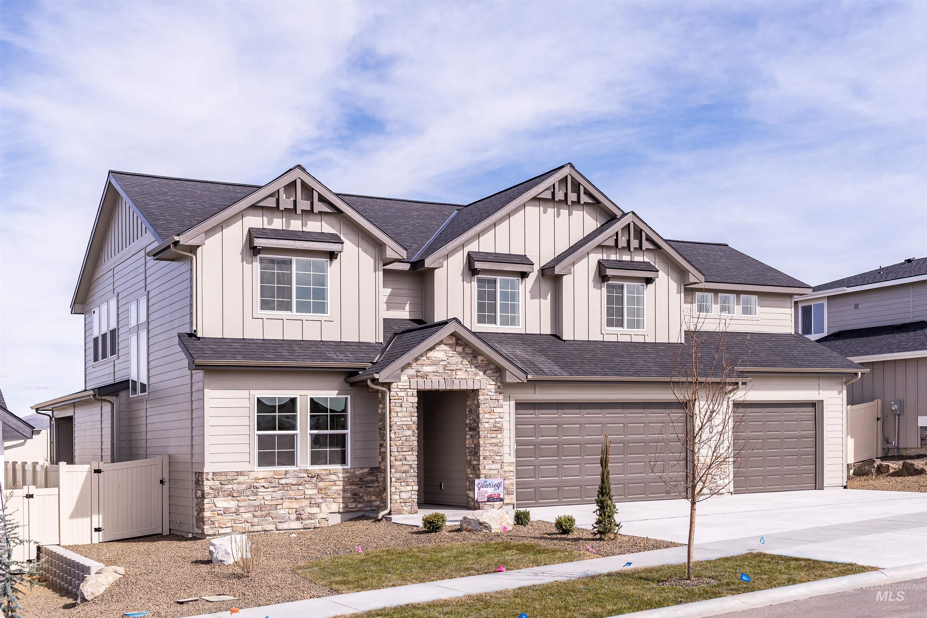 410 South Diesel Way Boise, ID 83716 - Photo 1 of 49 Craftsman inspired home with a gate, board and batten siding, and a shingled roof