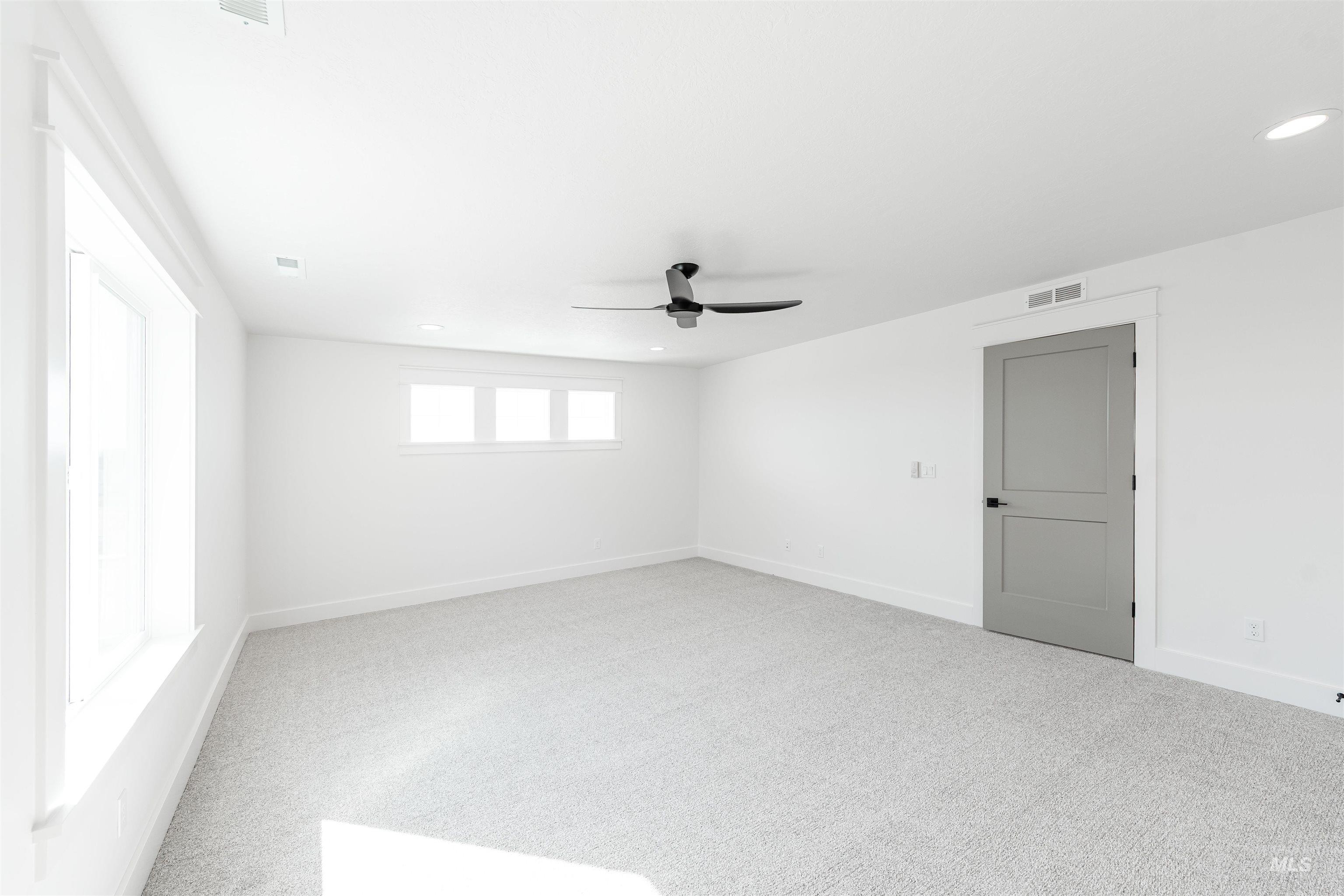 410 South Diesel Way Boise, ID 83716 - Photo 45 of 49 Unfurnished room featuring light colored carpet, ceiling fan, and recessed lighting