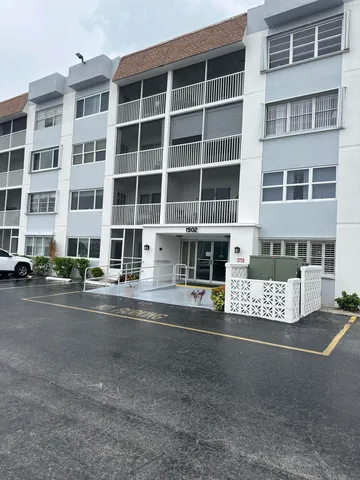 a front view of a building with street