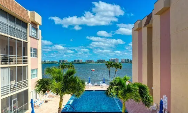 a view of a flower in front of a building