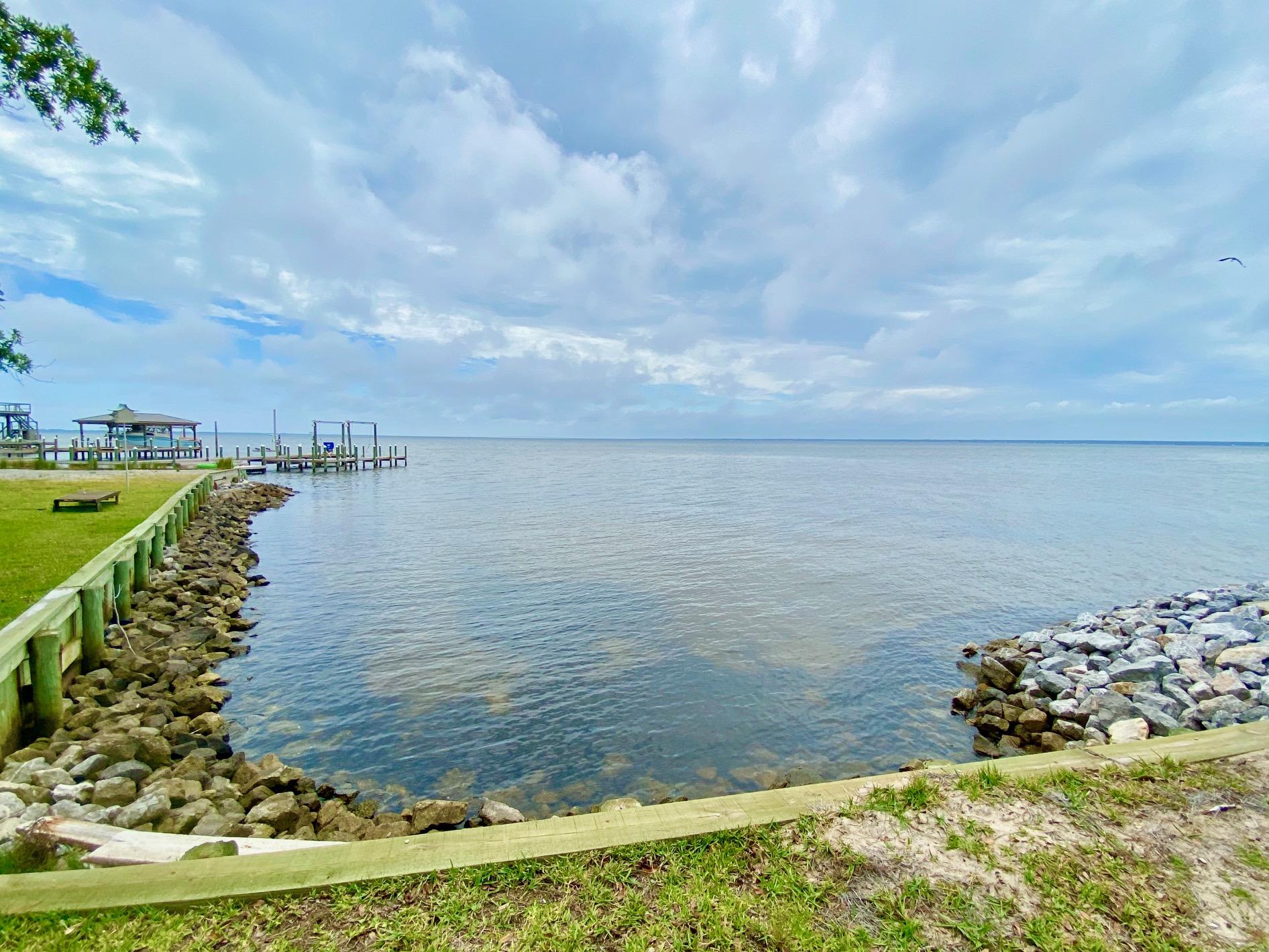 1.20-acres Driftwood Point Road Santa Rosa Beach, FL 32459 - Photo 2 of 9 a view of a lake with a big yard