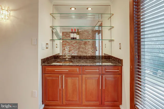 a view of a room with wooden walls