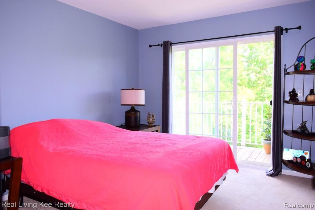 3438 Tremonte Circle Rochester, MI 48306 - Photo 12 of 23 spacious 2nd bedroom w/ slider to balcony