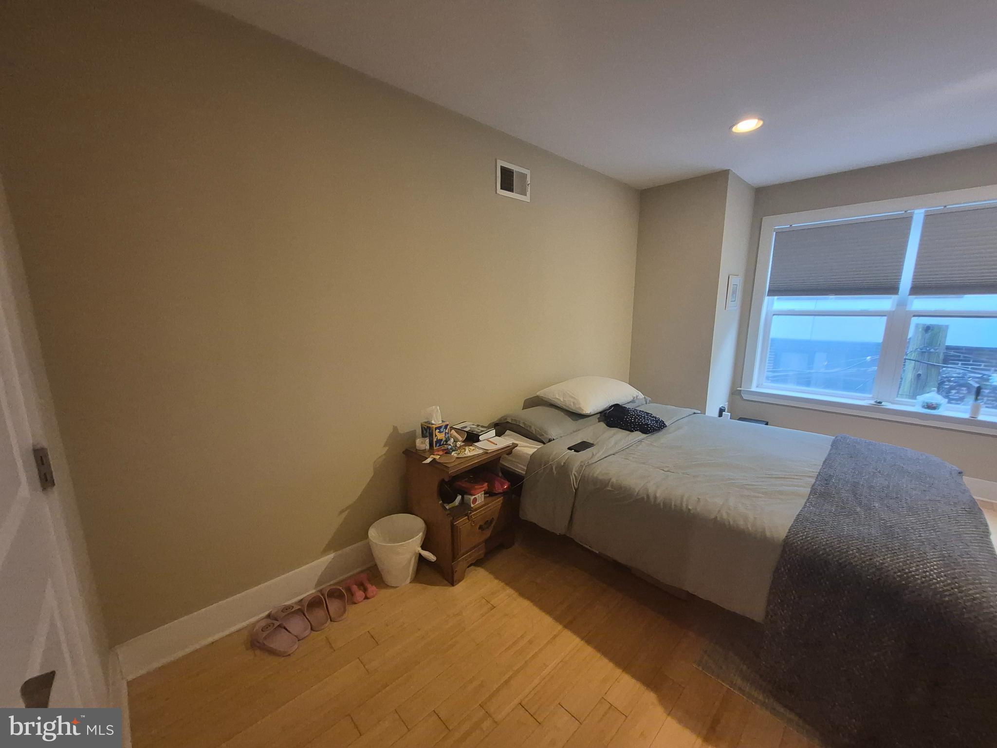 2544 Montrose Street Philadelphia, PA 19146 - Photo 12 of 23 a bedroom with a bed and window