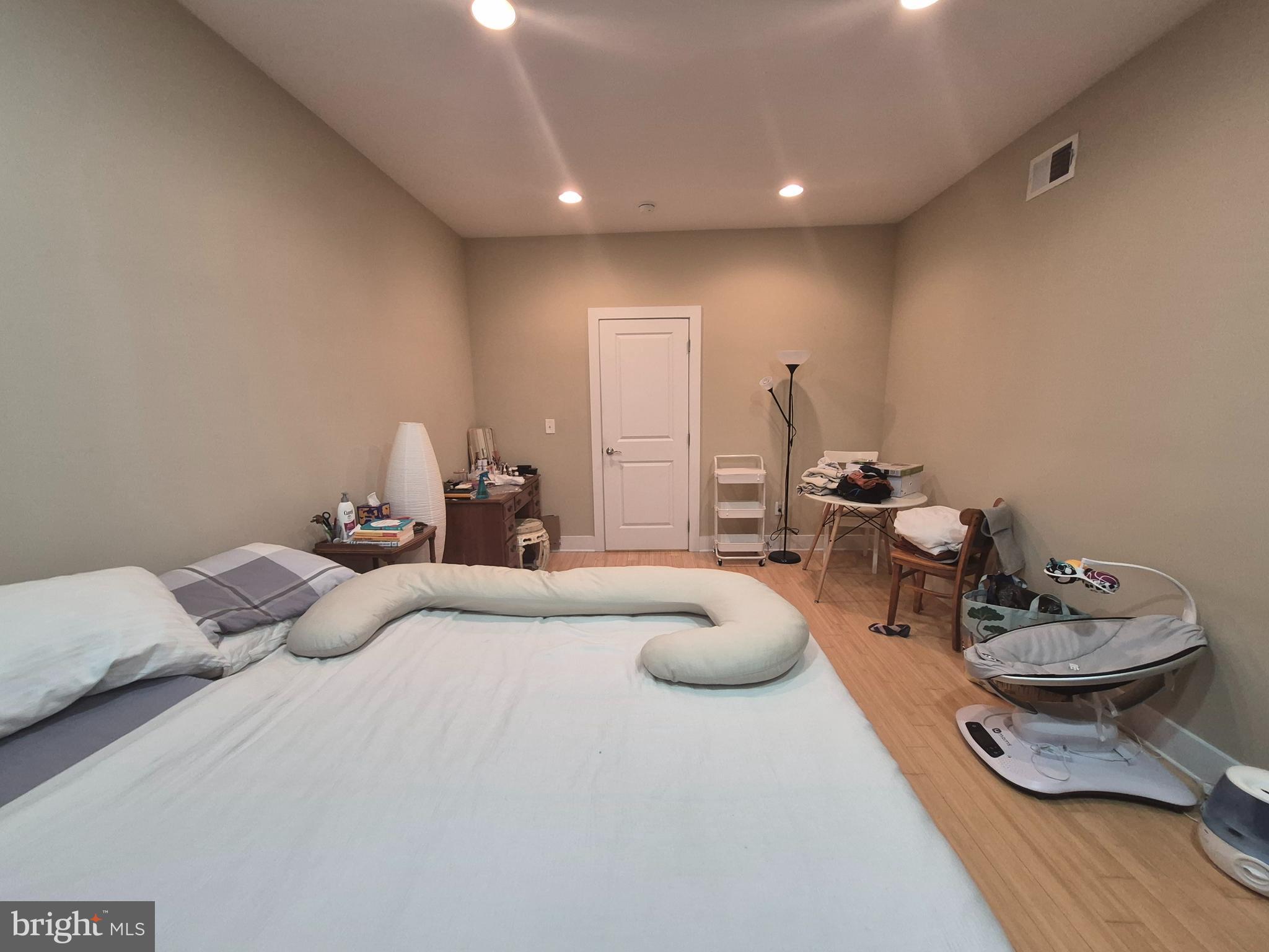 2544 Montrose Street Philadelphia, PA 19146 - Photo 18 of 23 a living room with two couches and wooden floor