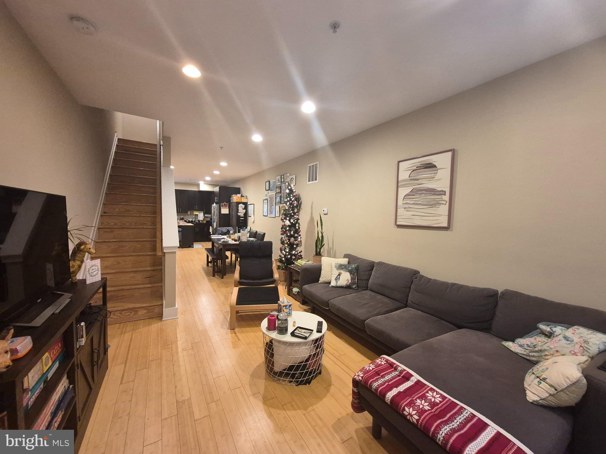 2544 Montrose Street Philadelphia, PA 19146 - Photo 2 of 23 a living room with furniture and a flat screen tv