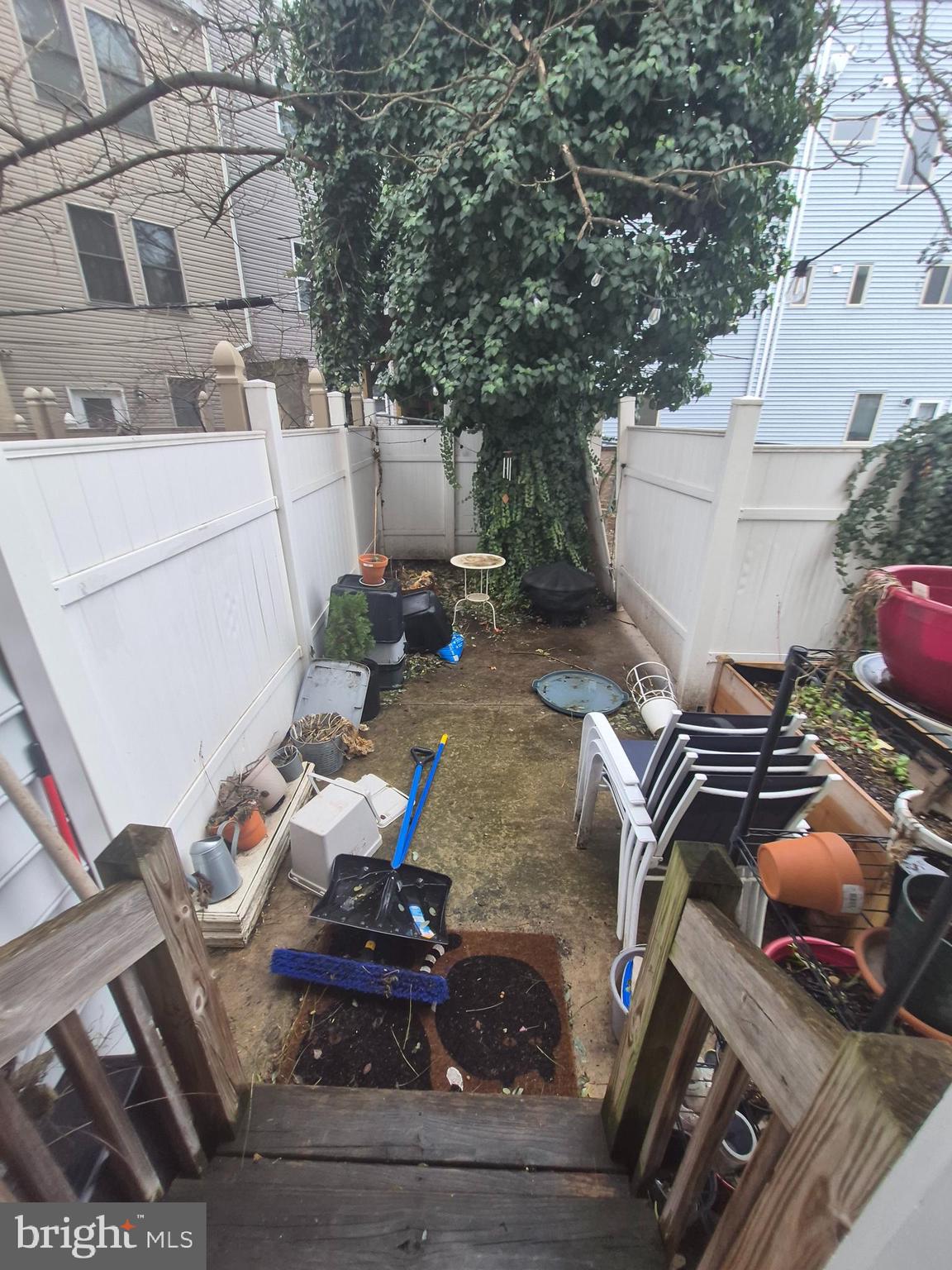 2544 Montrose Street Philadelphia, PA 19146 - Photo 23 of 23 a view of a backyard with chairs and stove
