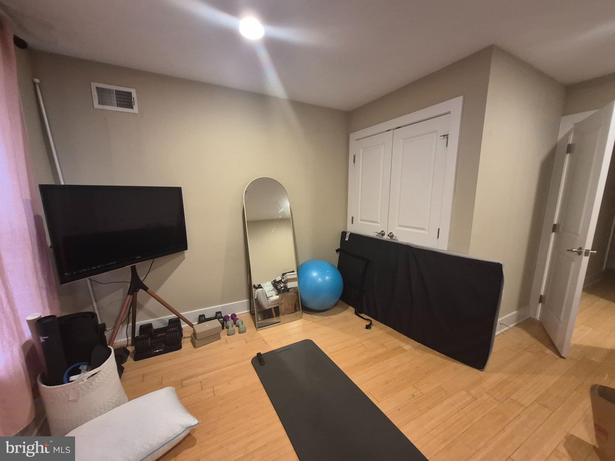 2544 Montrose Street Philadelphia, PA 19146 - Photo 8 of 23 a bedroom with bed and mirror