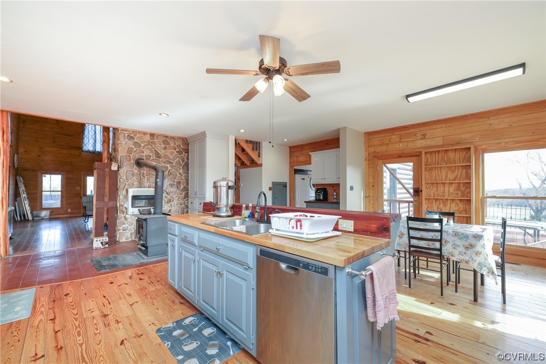 3913 Woodland Church Road Buckingham, VA 23921 - Photo 16 of 50 a open kitchen with stainless steel appliances granite countertop a stove and a sink