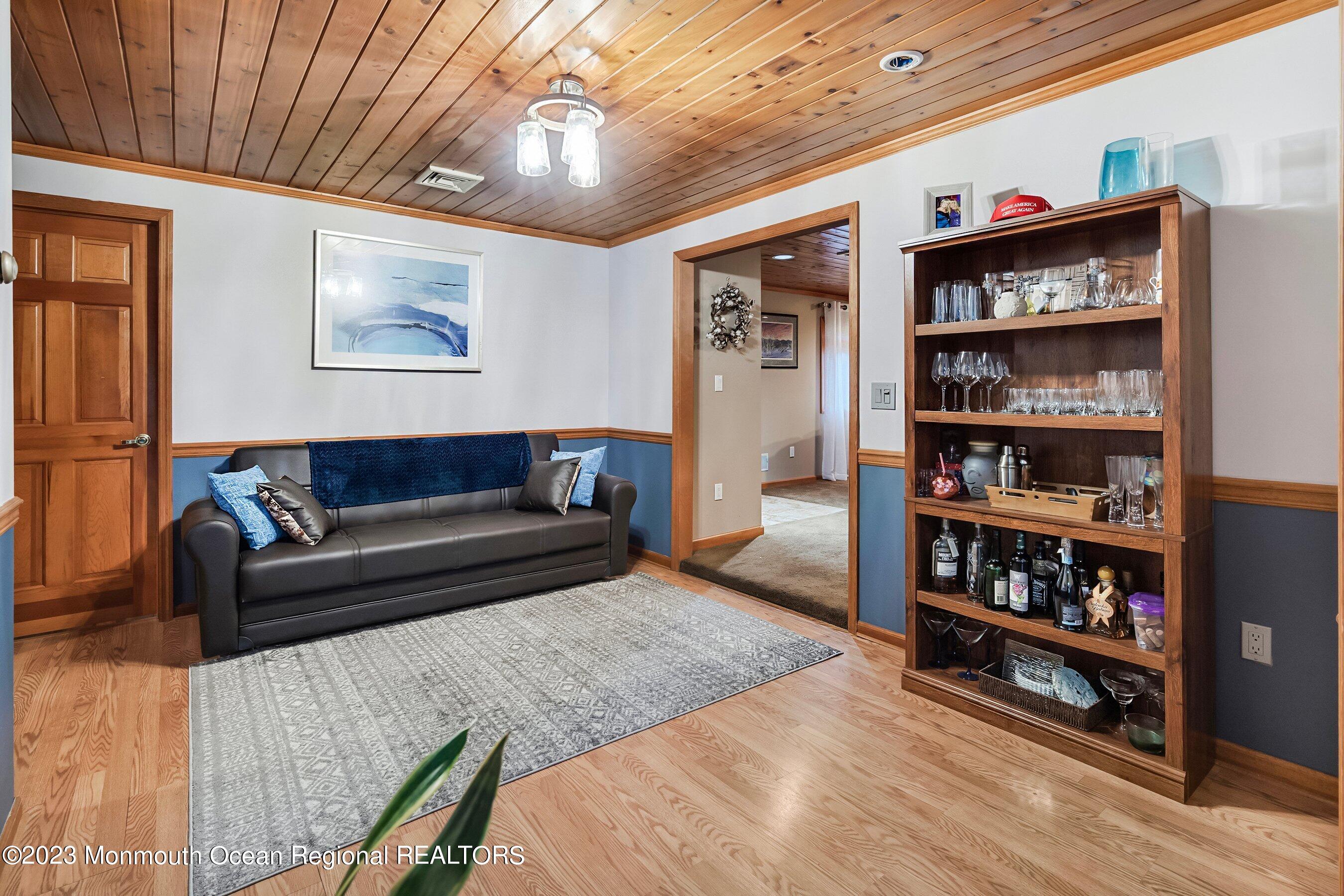 375 Cook Road Jackson, NJ 08527 - Photo 11 of 22 a living room with hard wood floors and a couch