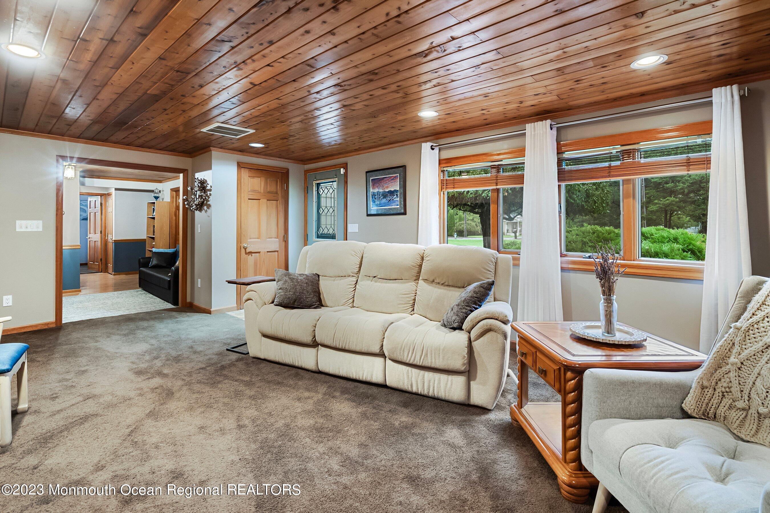 375 Cook Road Jackson, NJ 08527 - Photo 13 of 22 a living room with furniture and a large window