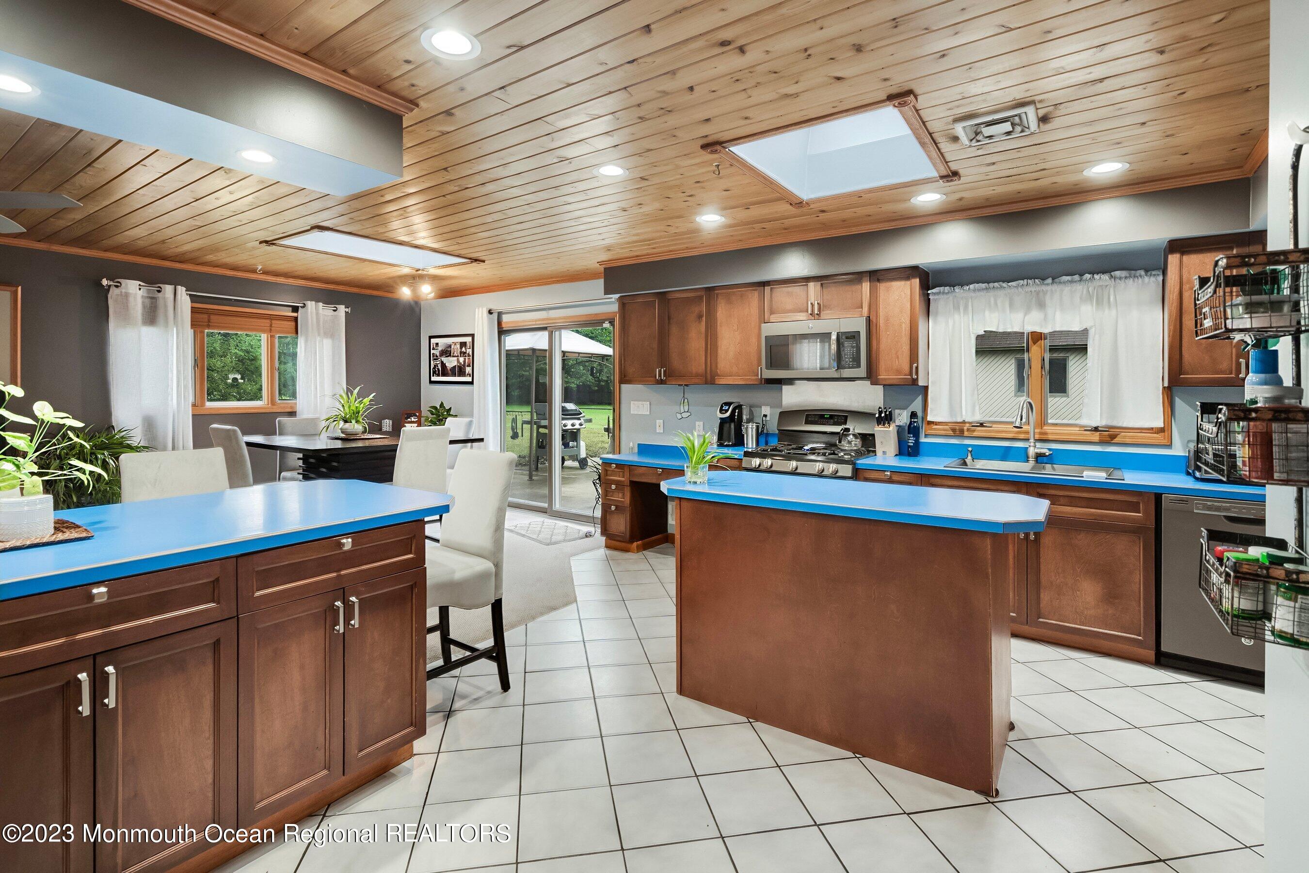 375 Cook Road Jackson, NJ 08527 - Photo 15 of 22 a kitchen with stainless steel appliances granite countertop a sink counter space and cabinets