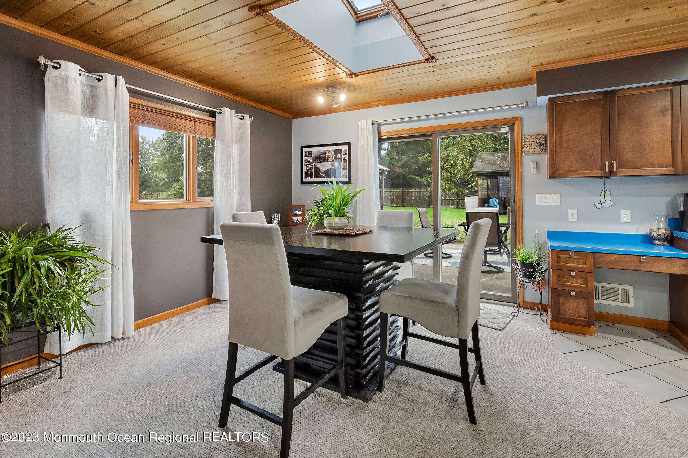 375 Cook Road Jackson, NJ 08527 - Photo 17 of 22 a view of a dining room with furniture window and outside view