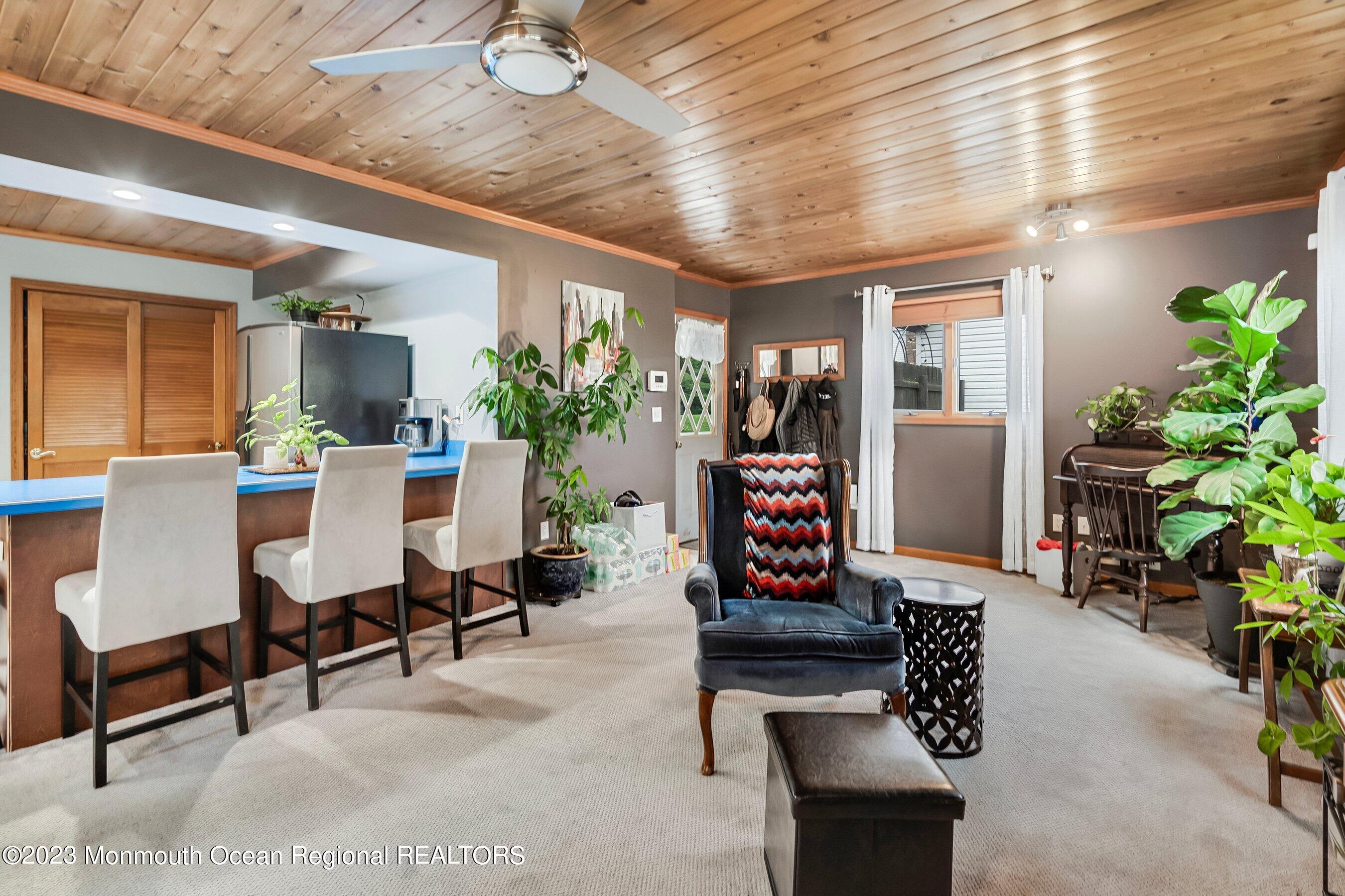 375 Cook Road Jackson, NJ 08527 - Photo 18 of 22 a living room with furniture and a potted plant