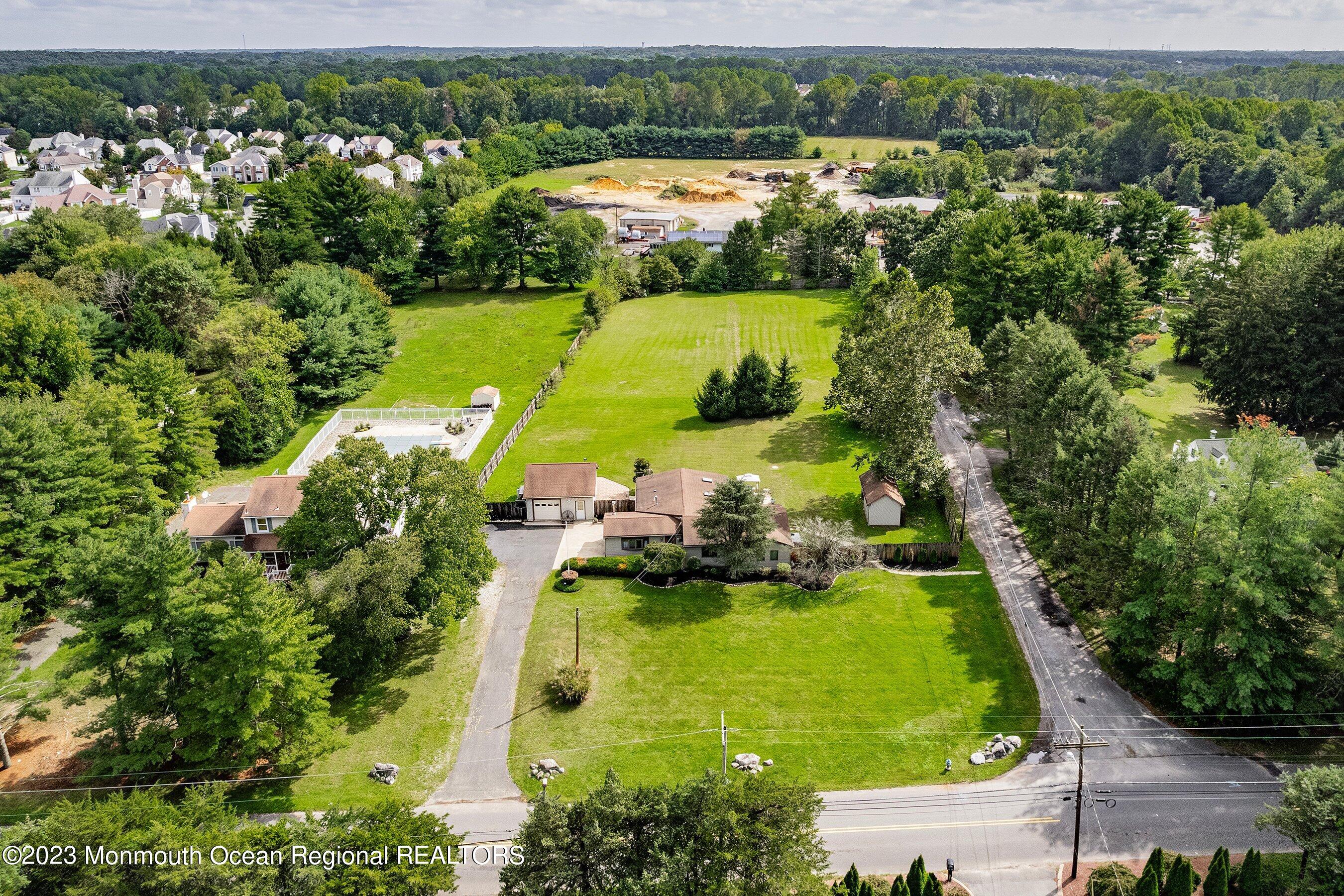 375 Cook Road Jackson, NJ 08527 - Photo 5 of 22 an aerial view of a residential houses with outdoor space and lake view