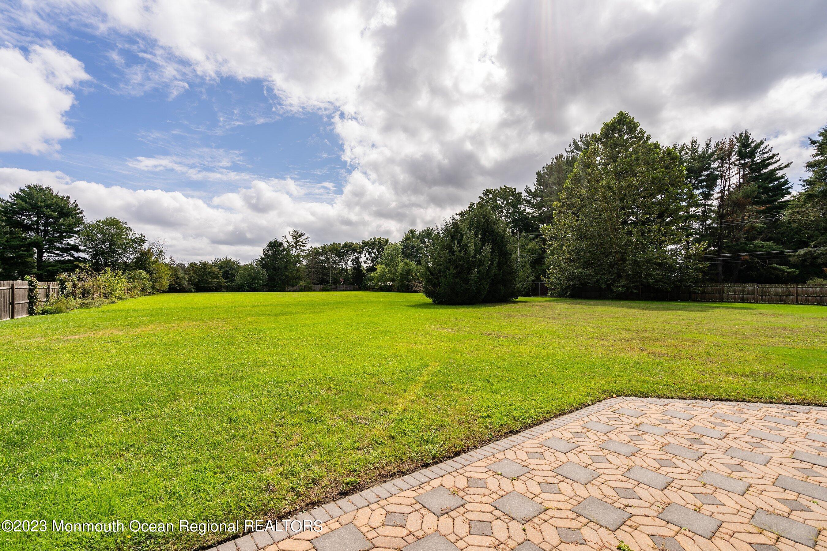 375 Cook Road Jackson, NJ 08527 - Photo 9 of 22 a view of yard with swimming pool and green space