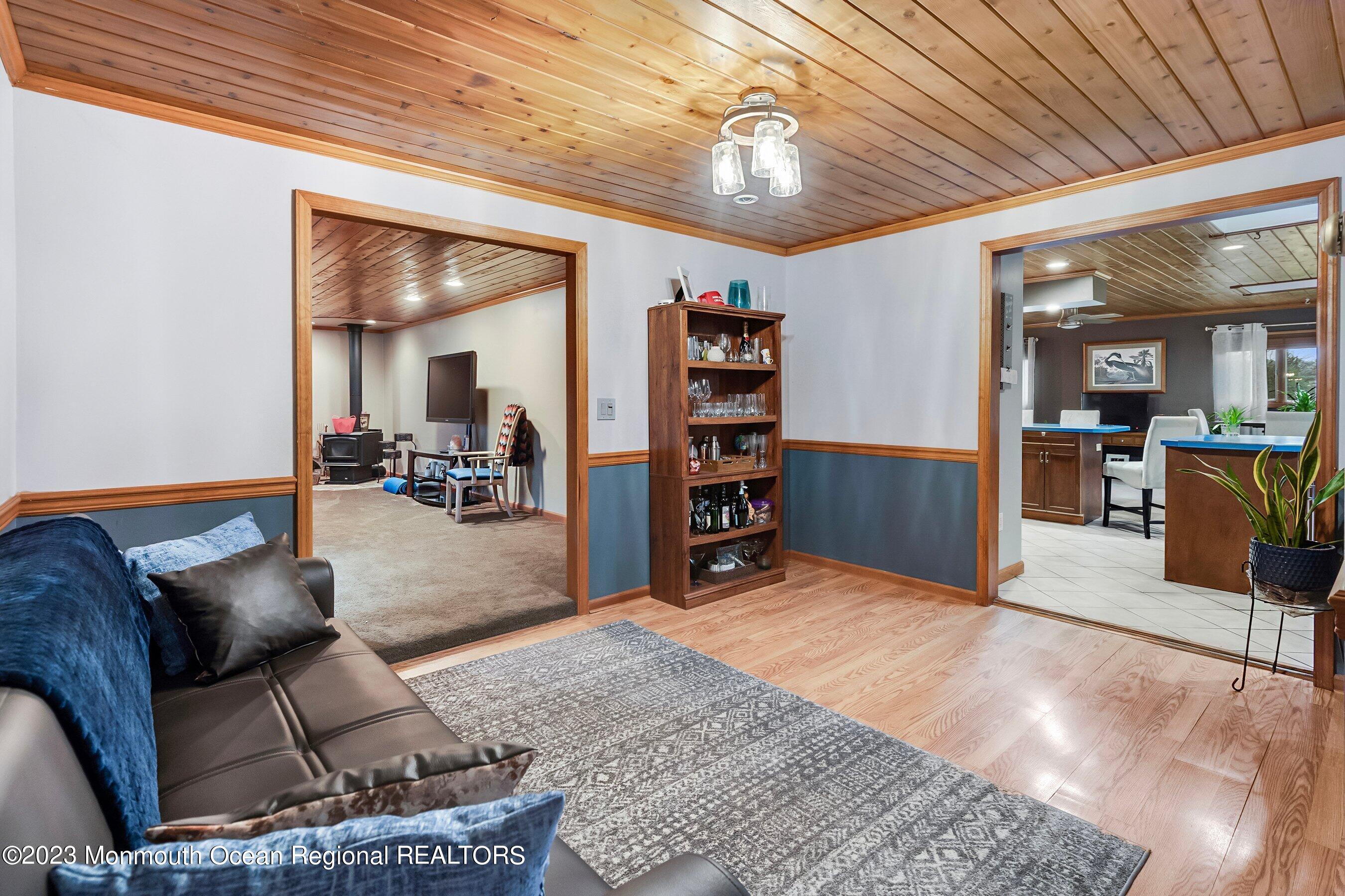 375 Cook Road Jackson, NJ 08527 - Photo 10 of 22 a living room with furniture and a wooden floor