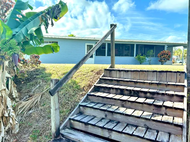 a view of swimming pool with a patio