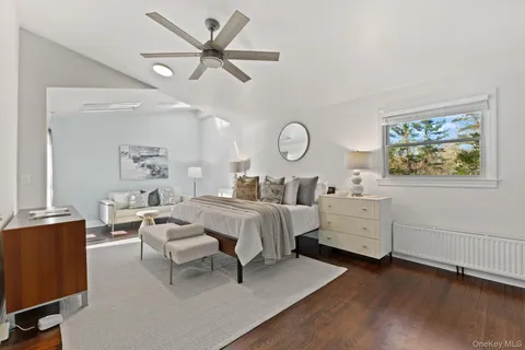 a bed room with furniture and a window