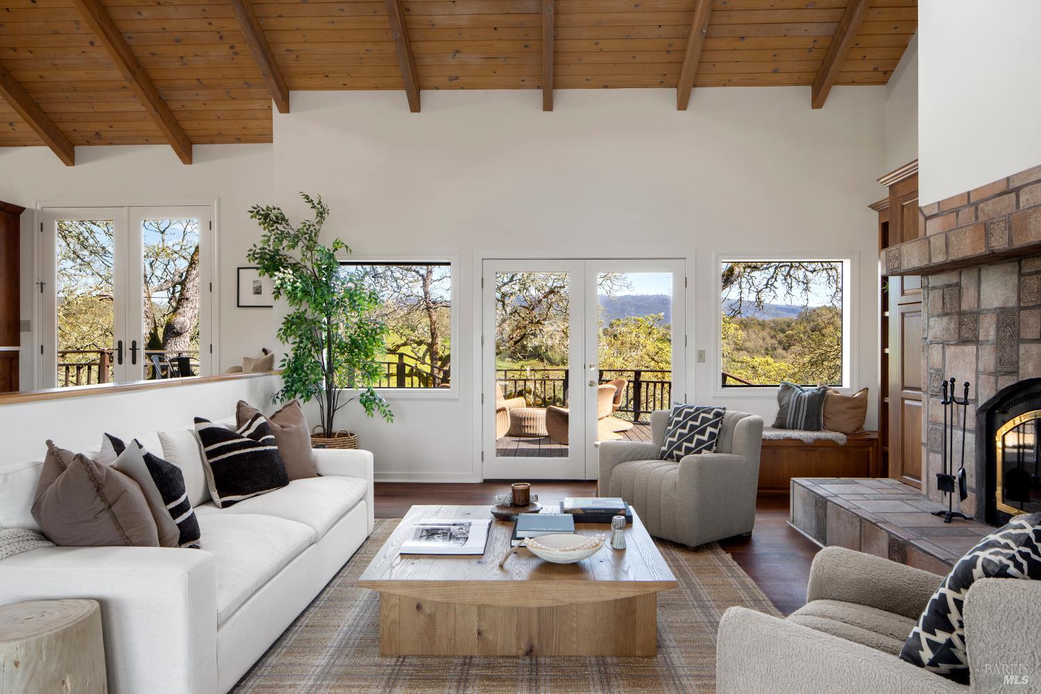 3460 Warm Springs Road Glen Ellen, CA 95442 - Photo 1 of 40 a living room with furniture large window and flat screen tv